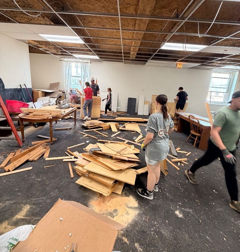 Mission volunteers working on a renovation and cleanup project
